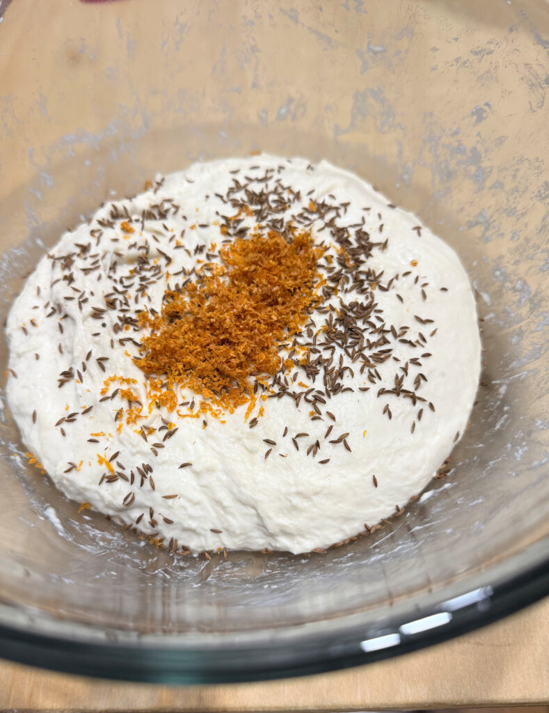 Orange Zest and Toasted Caraway Seeds on the Dough