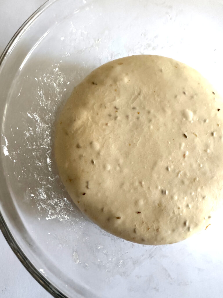 Orange Zest Sourdough Dough fermenting in the bowl