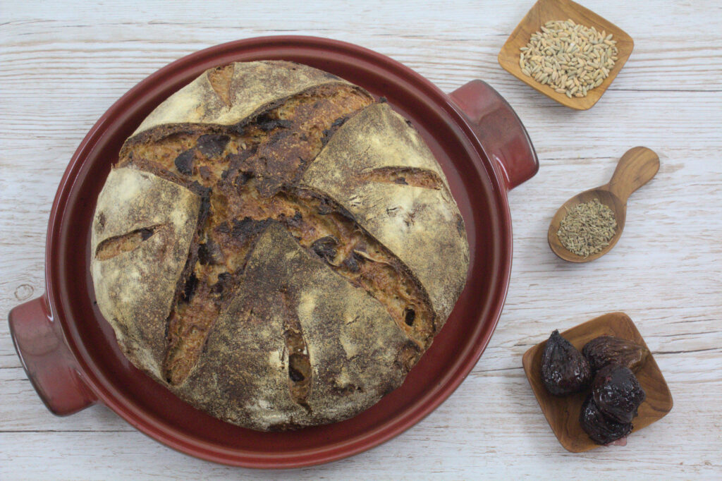 Sourdough Fig and Walnut Loaf baked in a bread cloche
