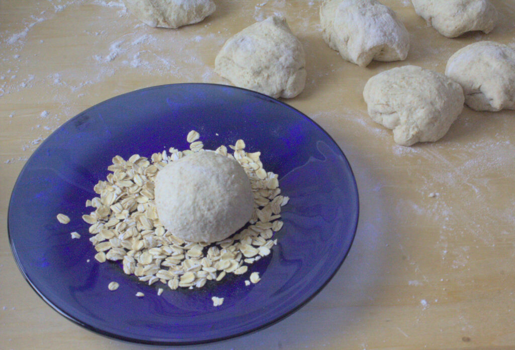 Sigteboller Danish Salty Rye Rolls dough pressed into rolled oats