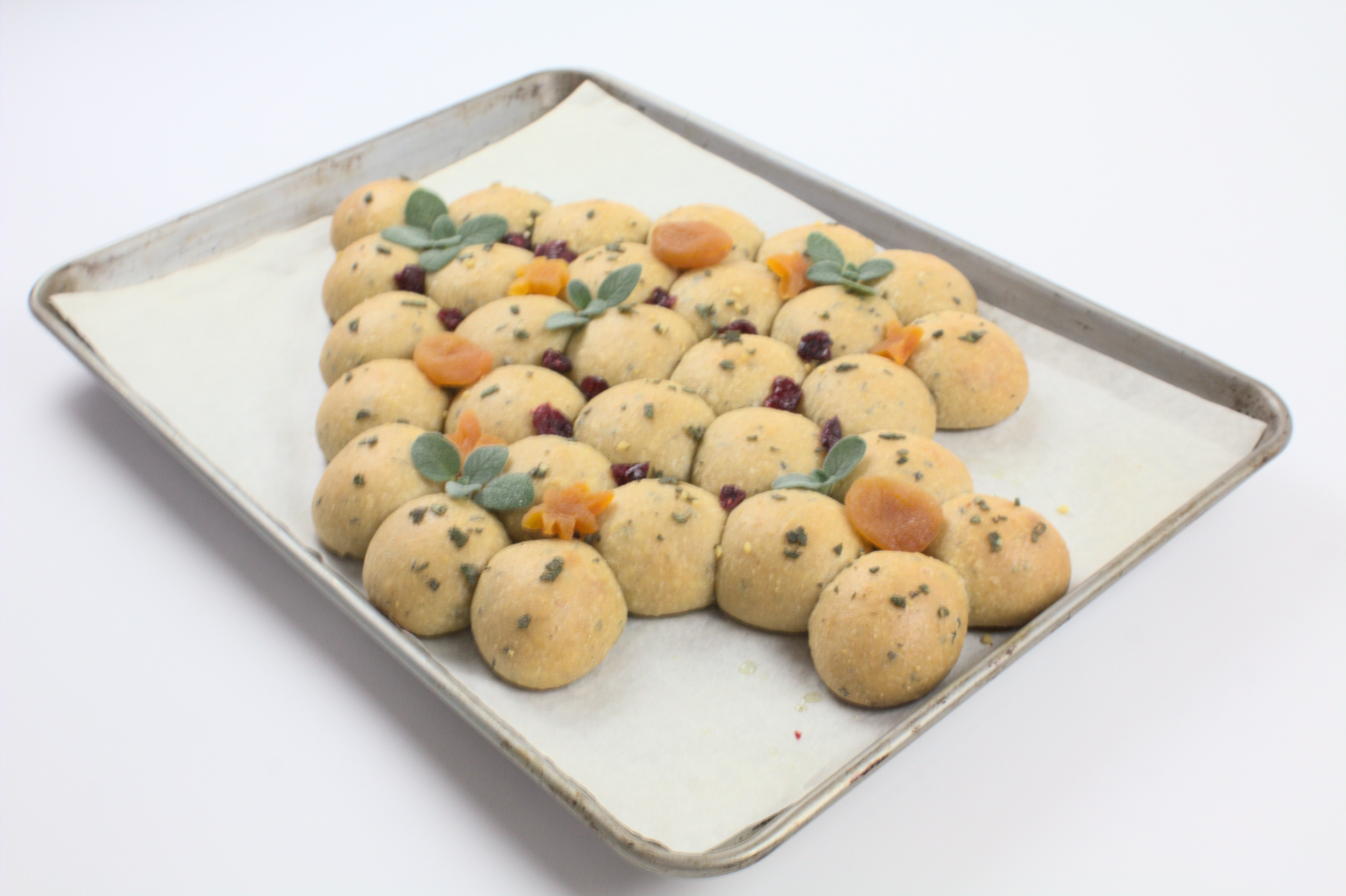 Sourdough Herb Milk Bread Rolls formed like a Christmas Tree