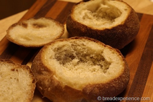 Scoop out inside of bread bowls