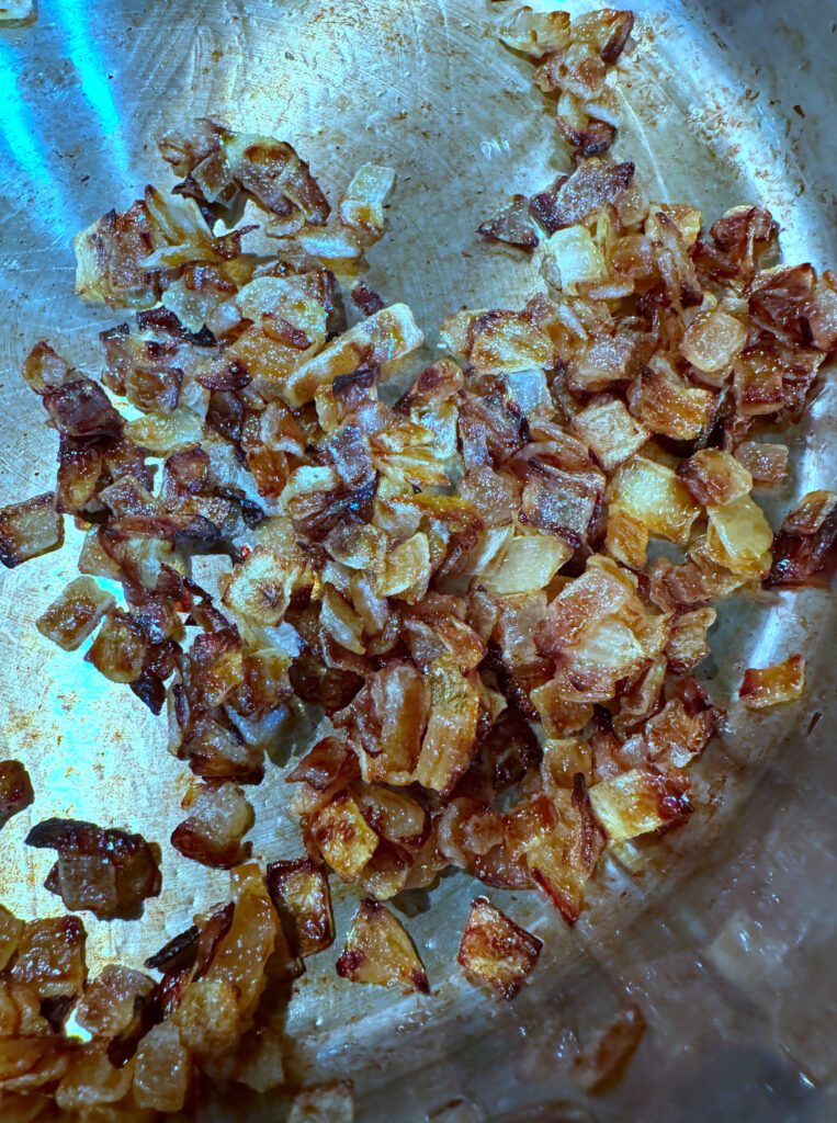 Caramelizing onions slowly and gently in the pan