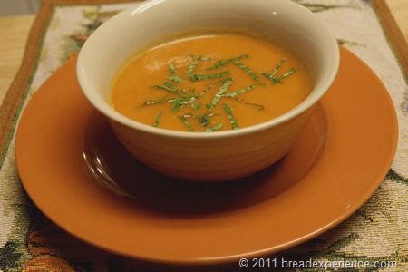 classic tomato soup garnished with herbs
