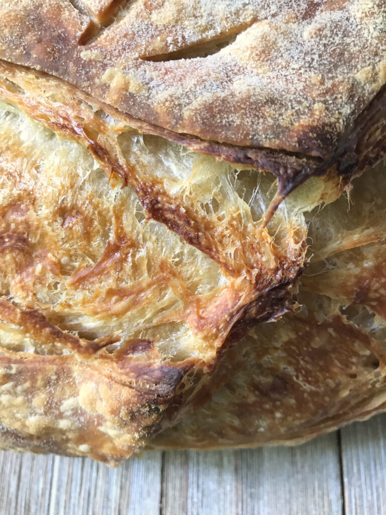 Closeup of Flaky Sourdough Croissant Bread