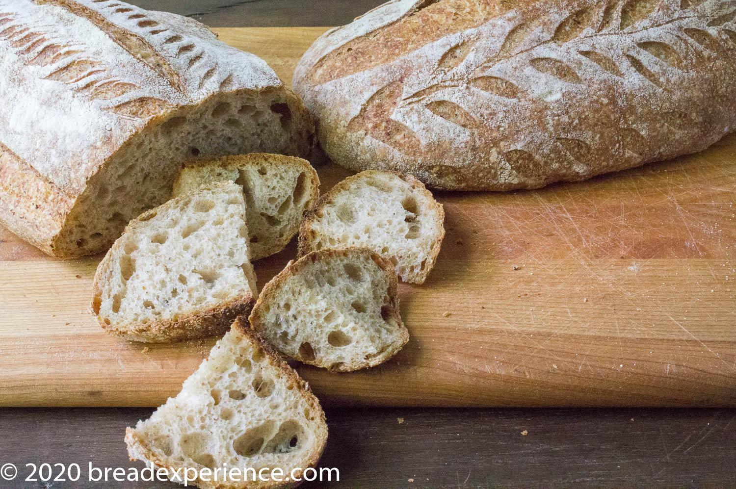 Crumb shot of oval loaf with decorative scoring