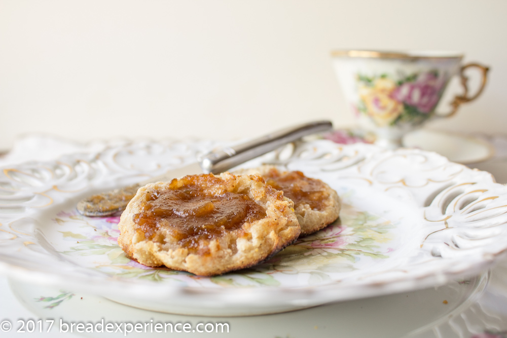 Sourdough English Muffins toasted and spread with apple butter