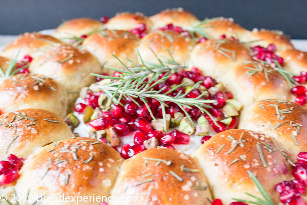 Einkorn Bread Roll Wreath with Baked Brie close up