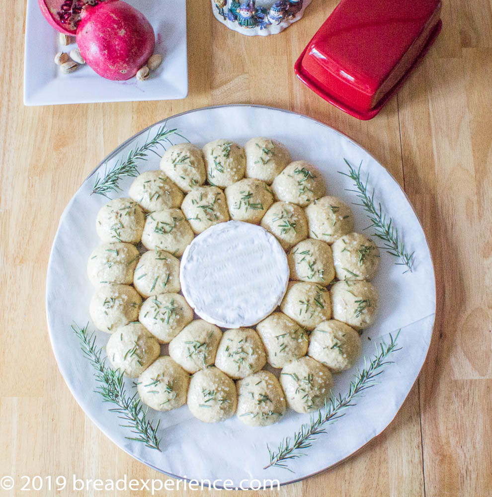 Bread rolls topped with rosemary and coarse salt