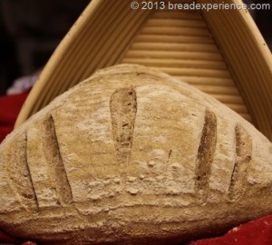 home-milled loaf in triange proofing basket