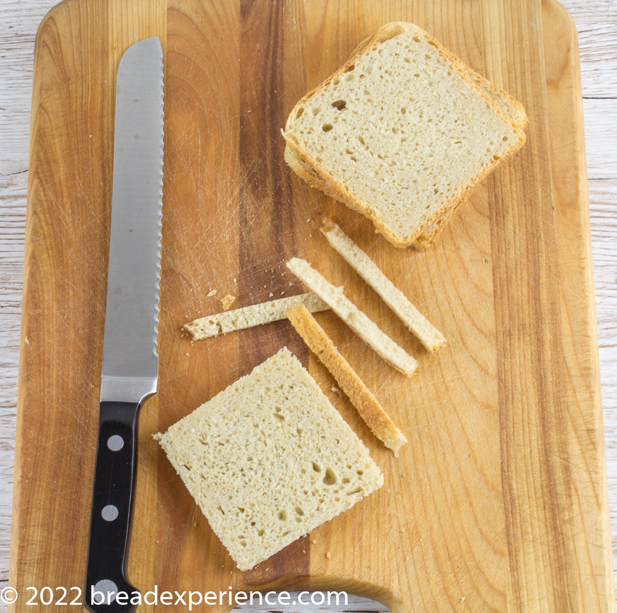 Removing the crusts from the loaf