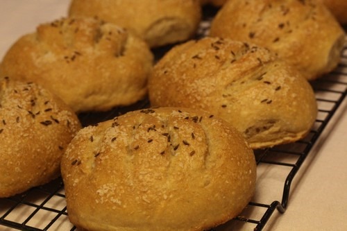 Kimmelweck Rolls on cooling rack