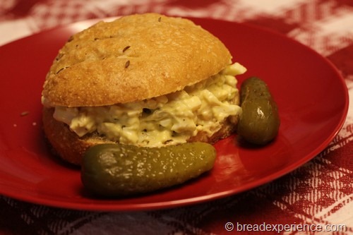 Kimmelweck Rolls served with egg salad and pickles