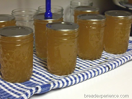 jars filled with jam ready for processing