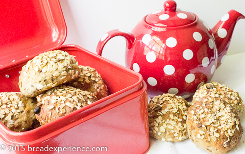 Muesli Rolls with Oat and Seed Soaker showcased in red