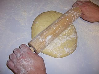 Rolling pizza dough