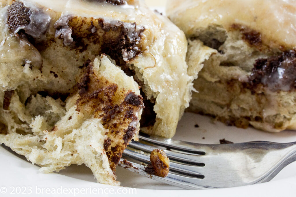 sourdough banana spelt sweet roll dough dotted with pecans