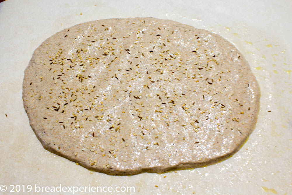 Sourdough Moroccan Ksra on parchment paper