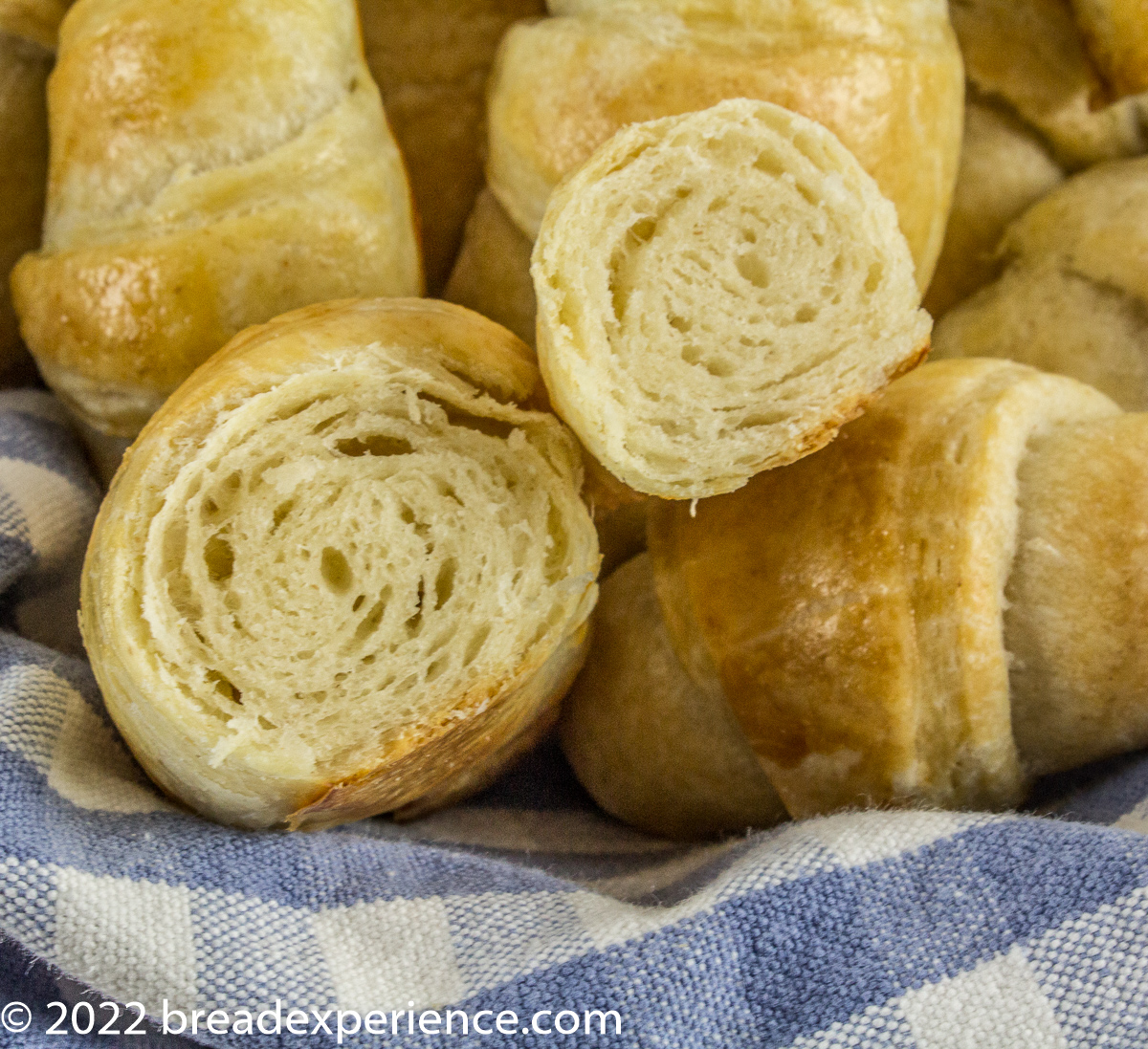 Sourdough Crescent Rolls - sliced to reveal layers