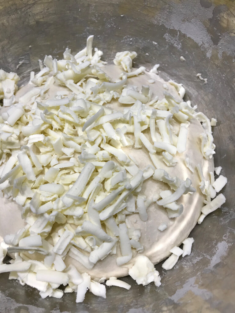 Grated butter ready to be folded into the dough