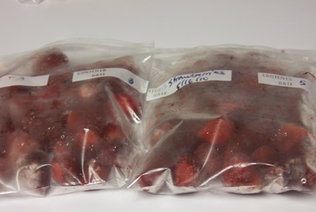 strawberries in bags ready to freeze