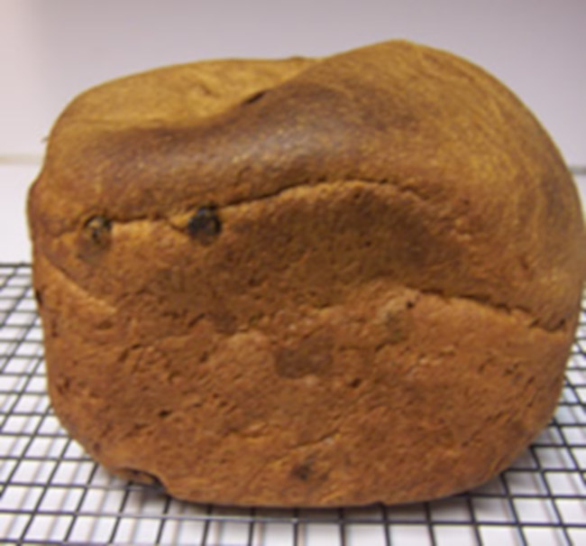 Cinnamon Raisin Bread Machine Bread Cooling on Rack